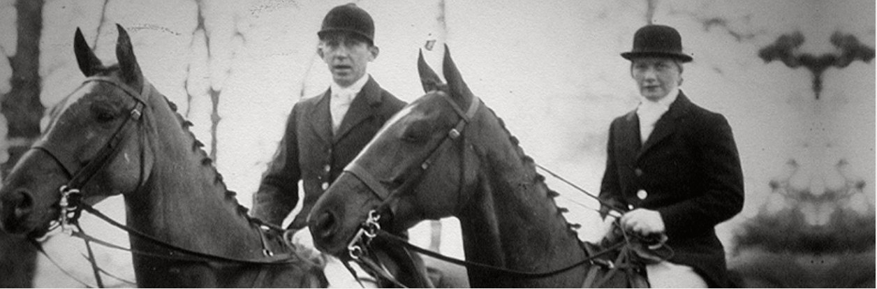 Pappy and Ginnie Moss on horseback in hunting attire